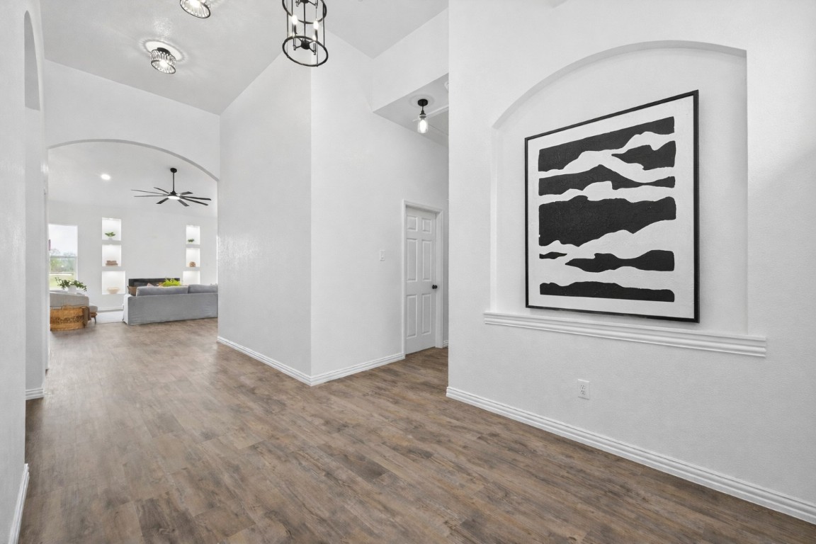 1105 Peter Pne Street Huffman, TX 77336 - Photo 20 of 41 a view of a hallway with wooden floor and a large window