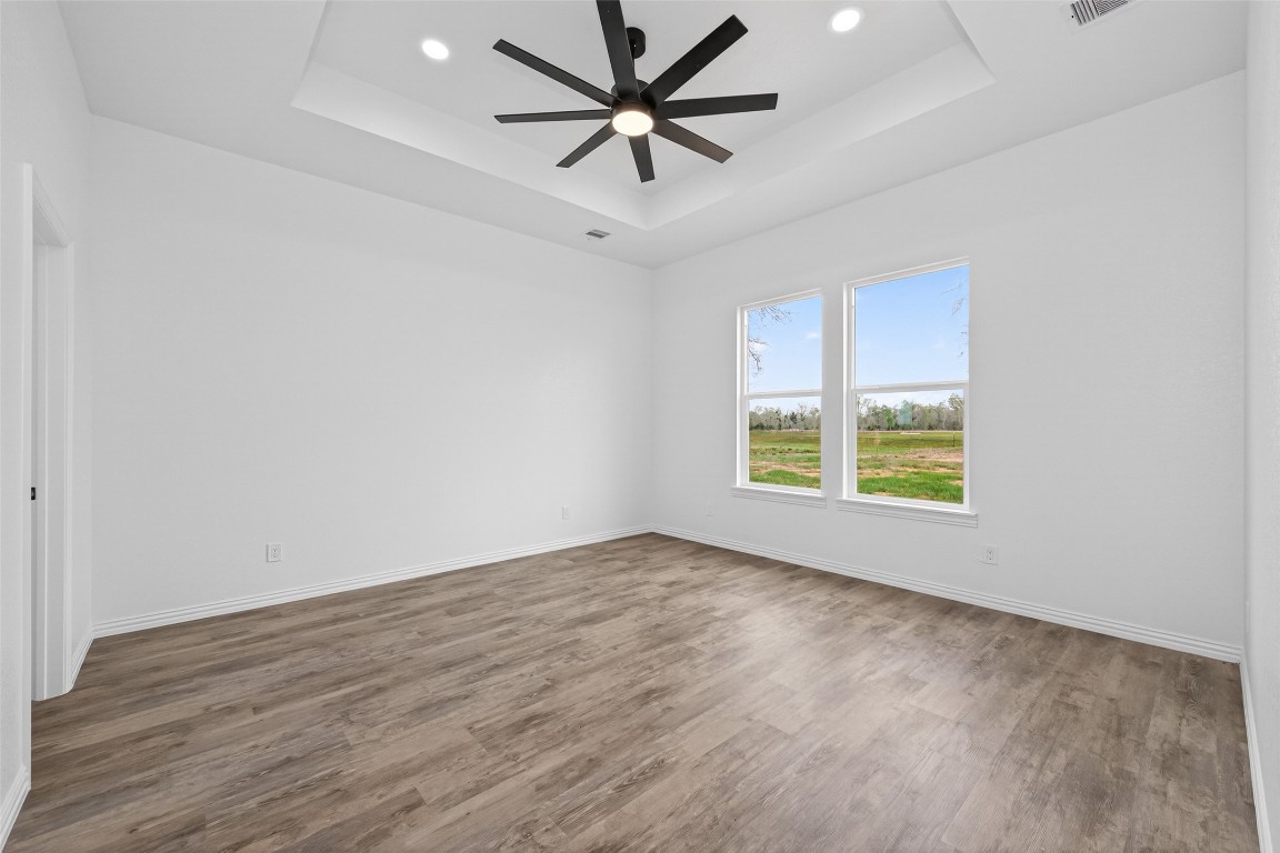 1105 Peter Pne Street Huffman, TX 77336 - Photo 22 of 41 wooden floor in an empty room with a window