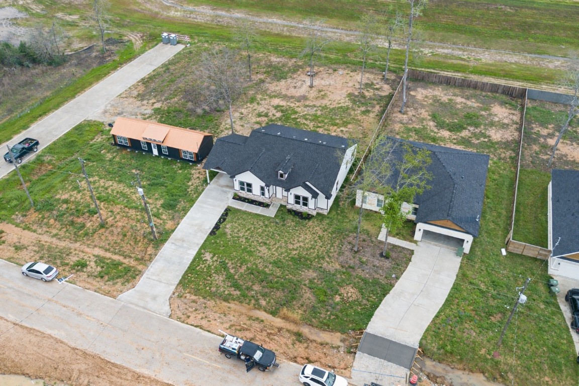 1105 Peter Pne Street Huffman, TX 77336 - Photo 39 of 41 a view of a garden with a wooden deck