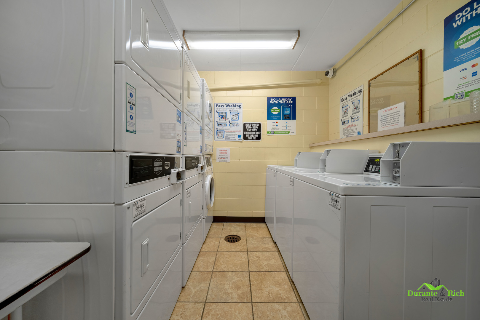 225 South Rohlwing Road, Unit 118 Palatine, IL 60074 - Photo 11 of 12 a kitchen with a white cabinets and white appliances