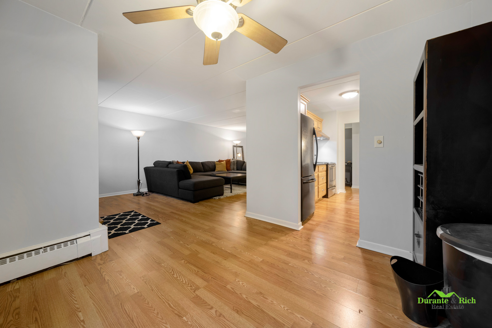 225 South Rohlwing Road, Unit 118 Palatine, IL 60074 - Photo 5 of 12 a view of livingroom with furniture and wooden floor