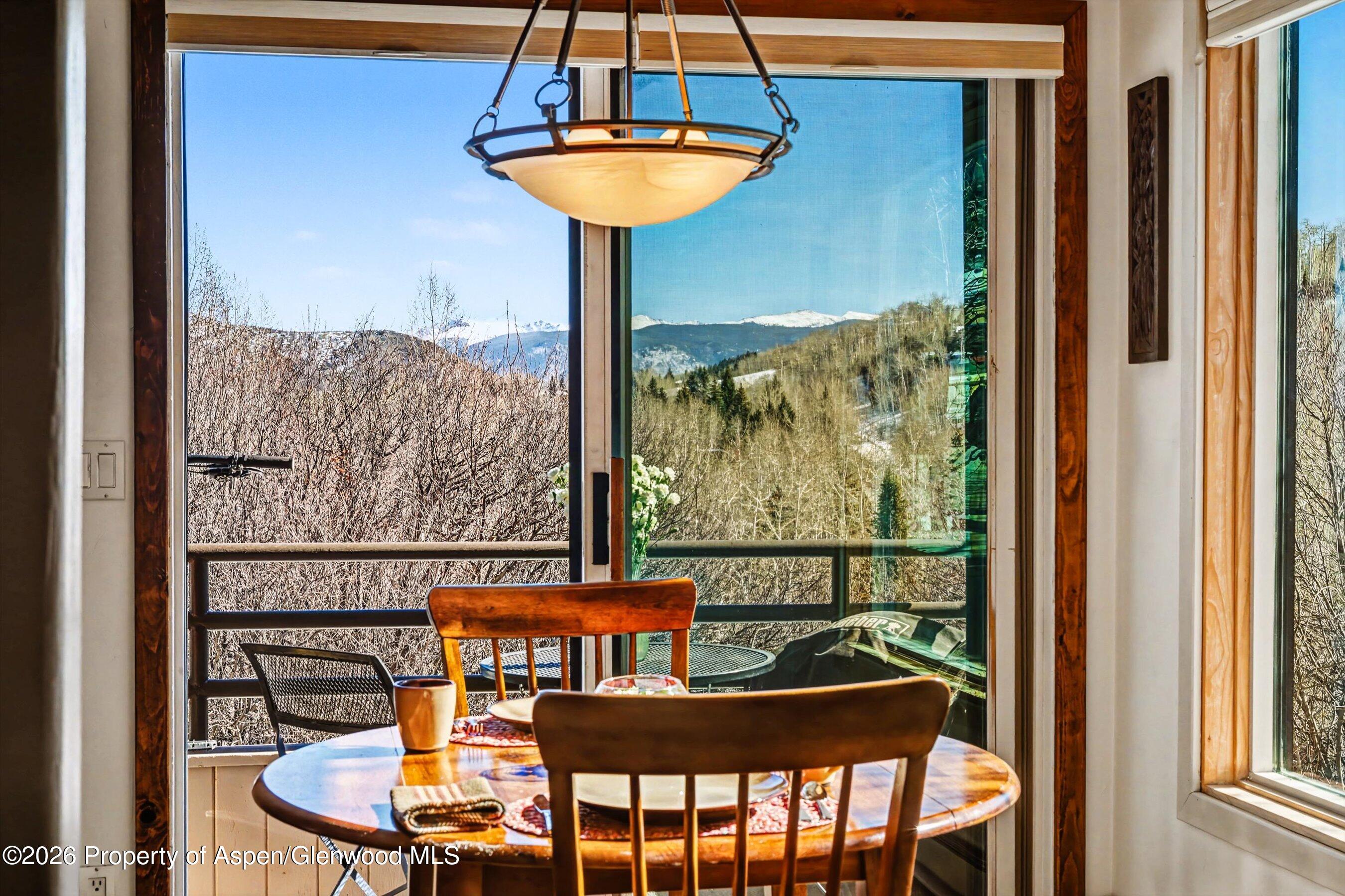 34 Lower Woodbridge Road, Unit 149 Snowmass Village, CO 81615 - Photo 9 of 15 a sitting area with furniture and a window