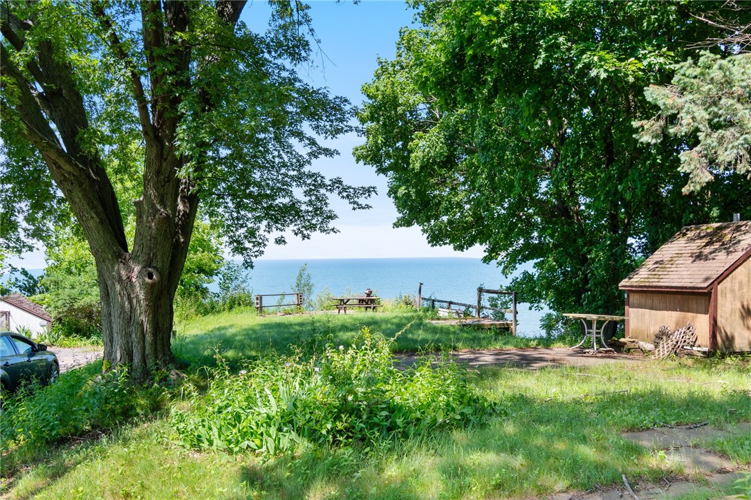 7945 Lake Road, Unit 129 Sodus, NY 14555 - Photo 4 of 22 Stroll to the waterfront- just a short walk to the BUILT IN POOL- there’s a playground too!