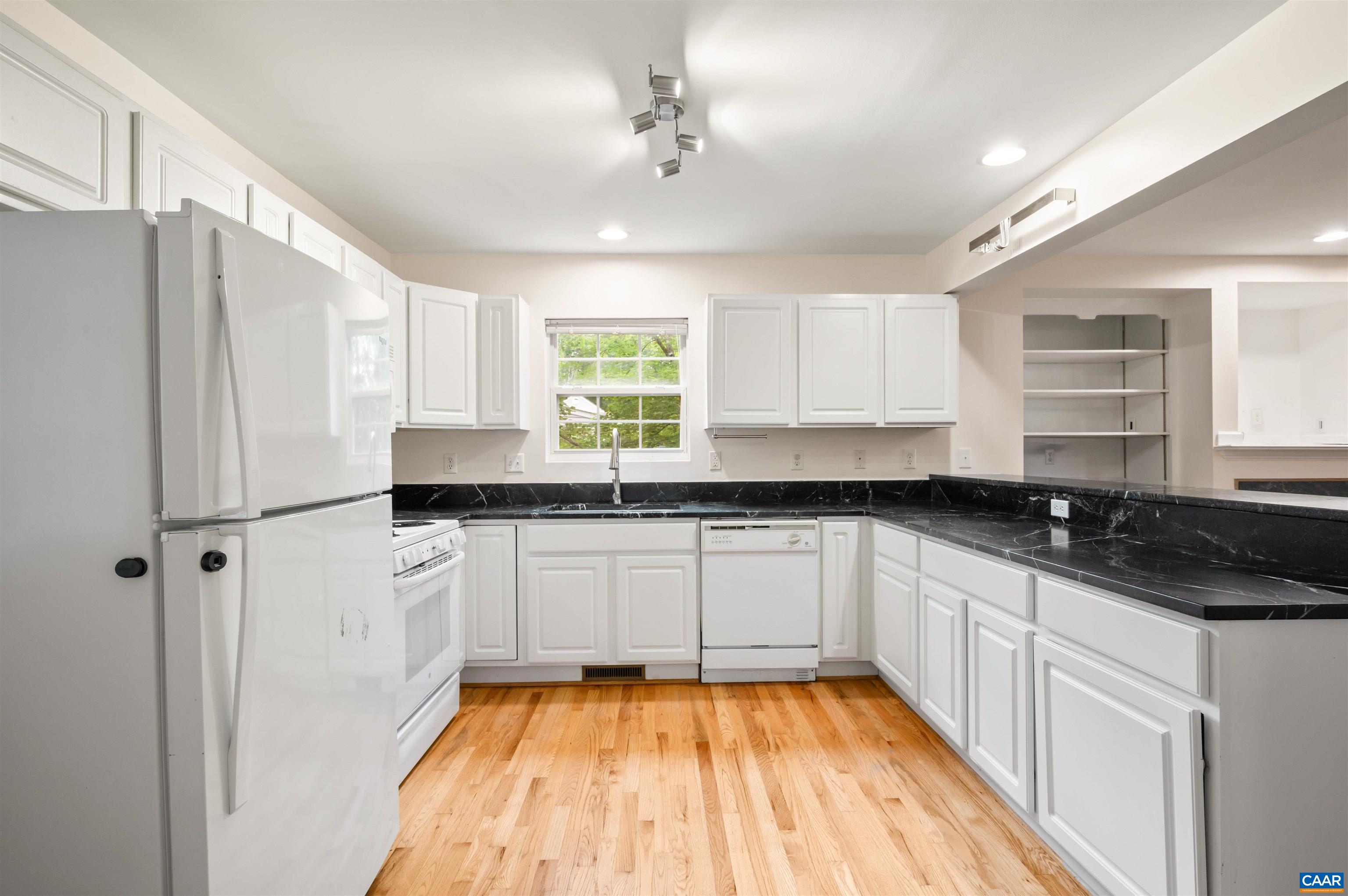 24 Xebec Road Palmyra, VA 22963 - Photo 12 of 41 a kitchen with granite countertop a sink stainless steel appliances and cabinets