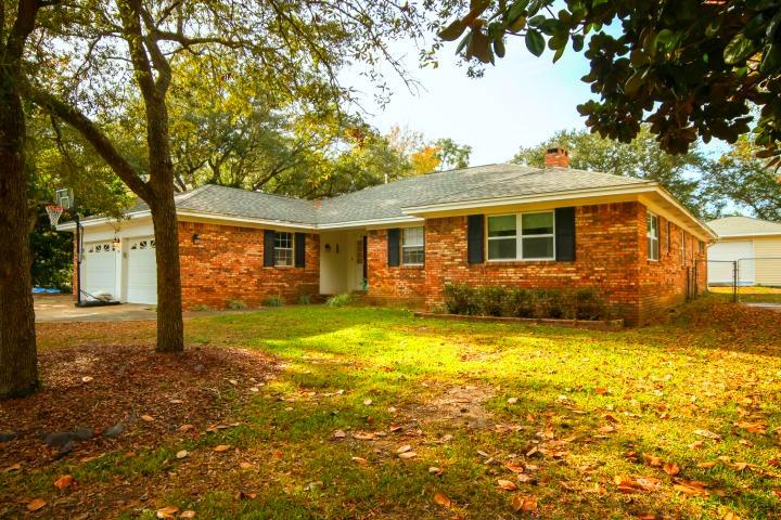 32 Country Club Road Shalimar, FL 32579 - Photo 1 of 56 a view of a house with a backyard