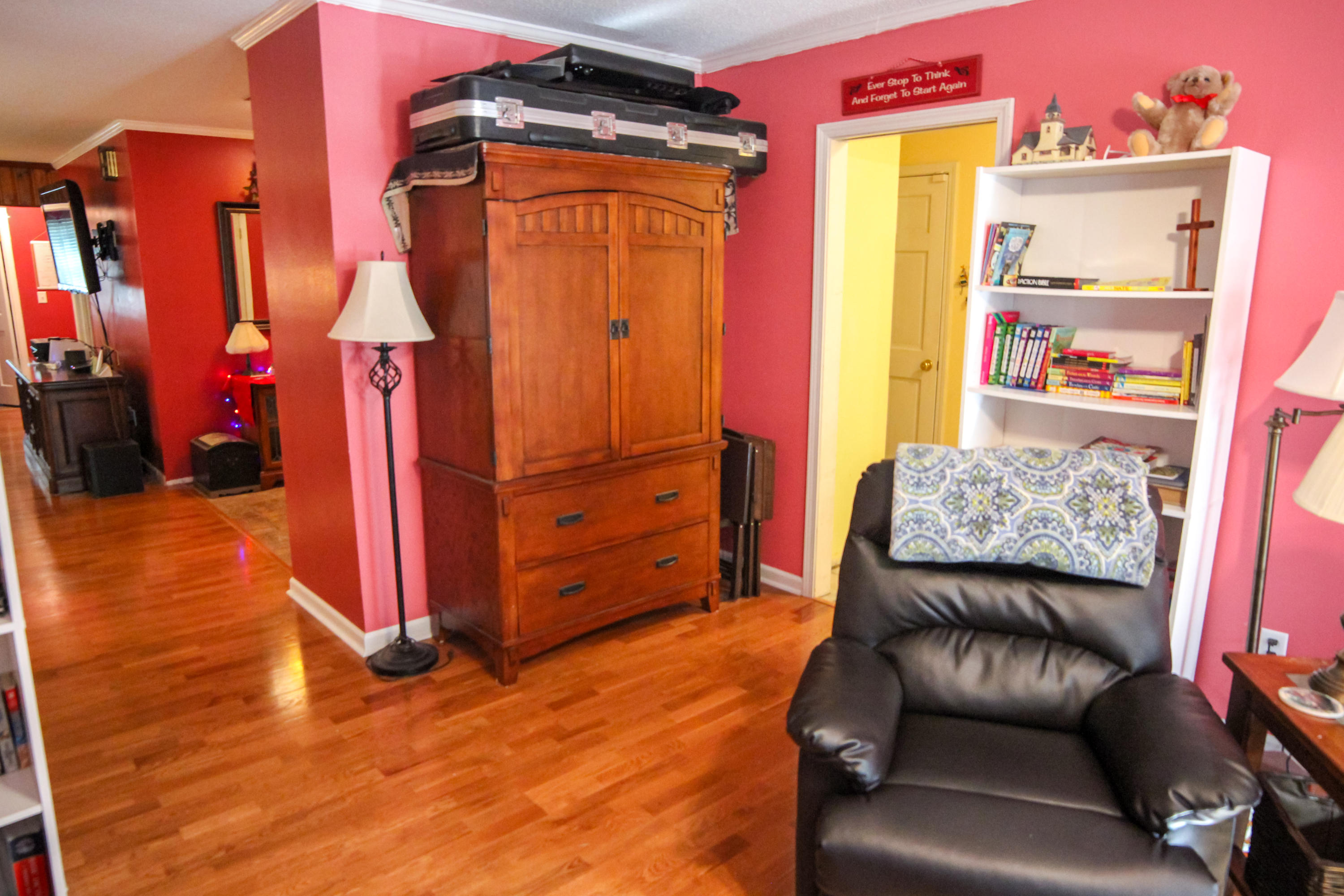 32 Country Club Road Shalimar, FL 32579 - Photo 23 of 56 a bedroom with a bed and wooden floor
