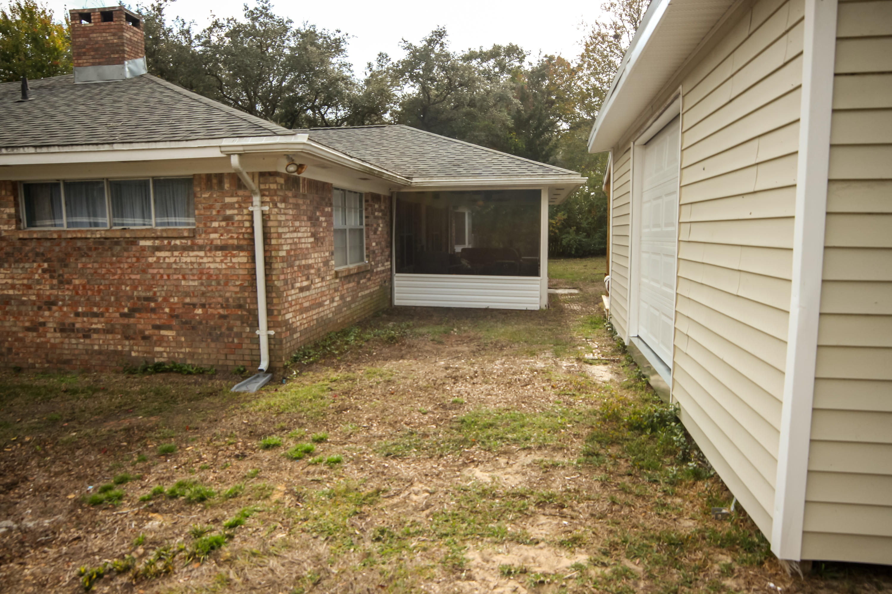 32 Country Club Road Shalimar, FL 32579 - Photo 50 of 56 a view of a house with a porch