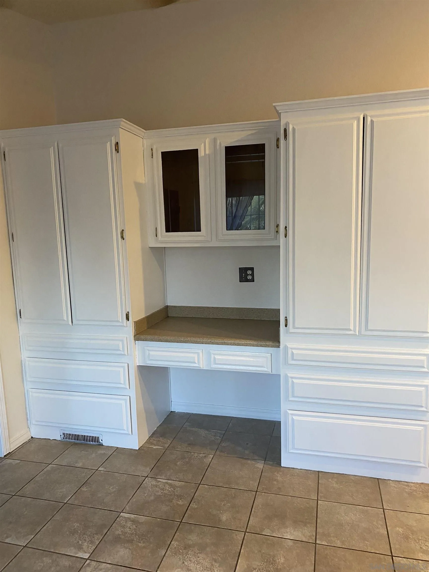 2768 Borrego Springs Road Borrego Springs, CA 92004 - Photo 13 of 55 a view of kitchen with stainless steel appliances cabinets and empty room