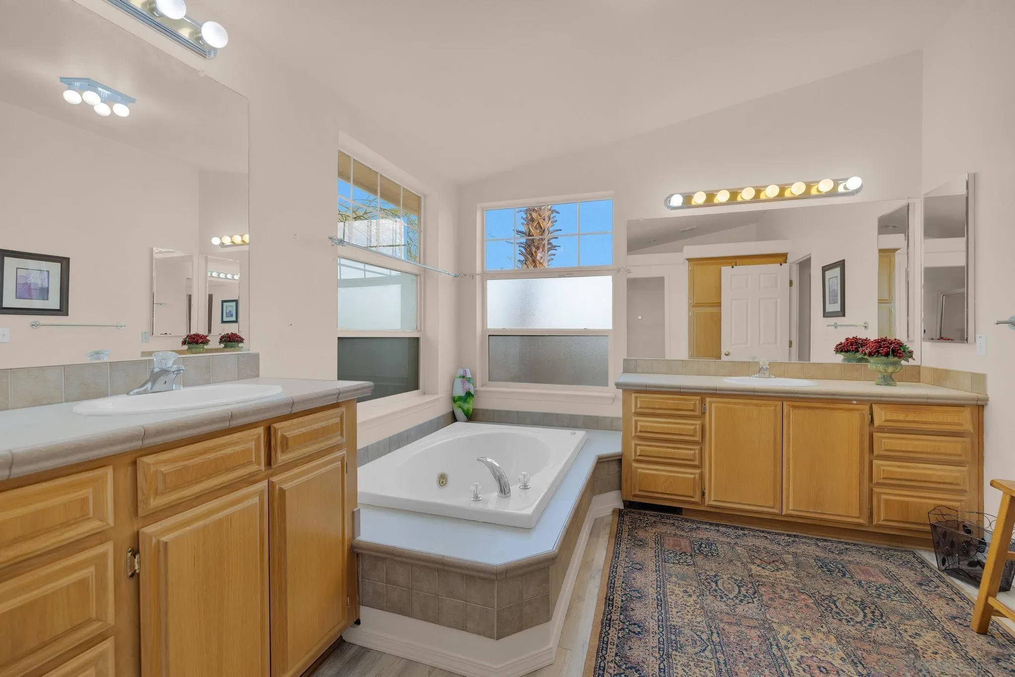 2768 Borrego Springs Road Borrego Springs, CA 92004 - Photo 24 of 55 a bathroom with a sink vanity granite tub and a mirror