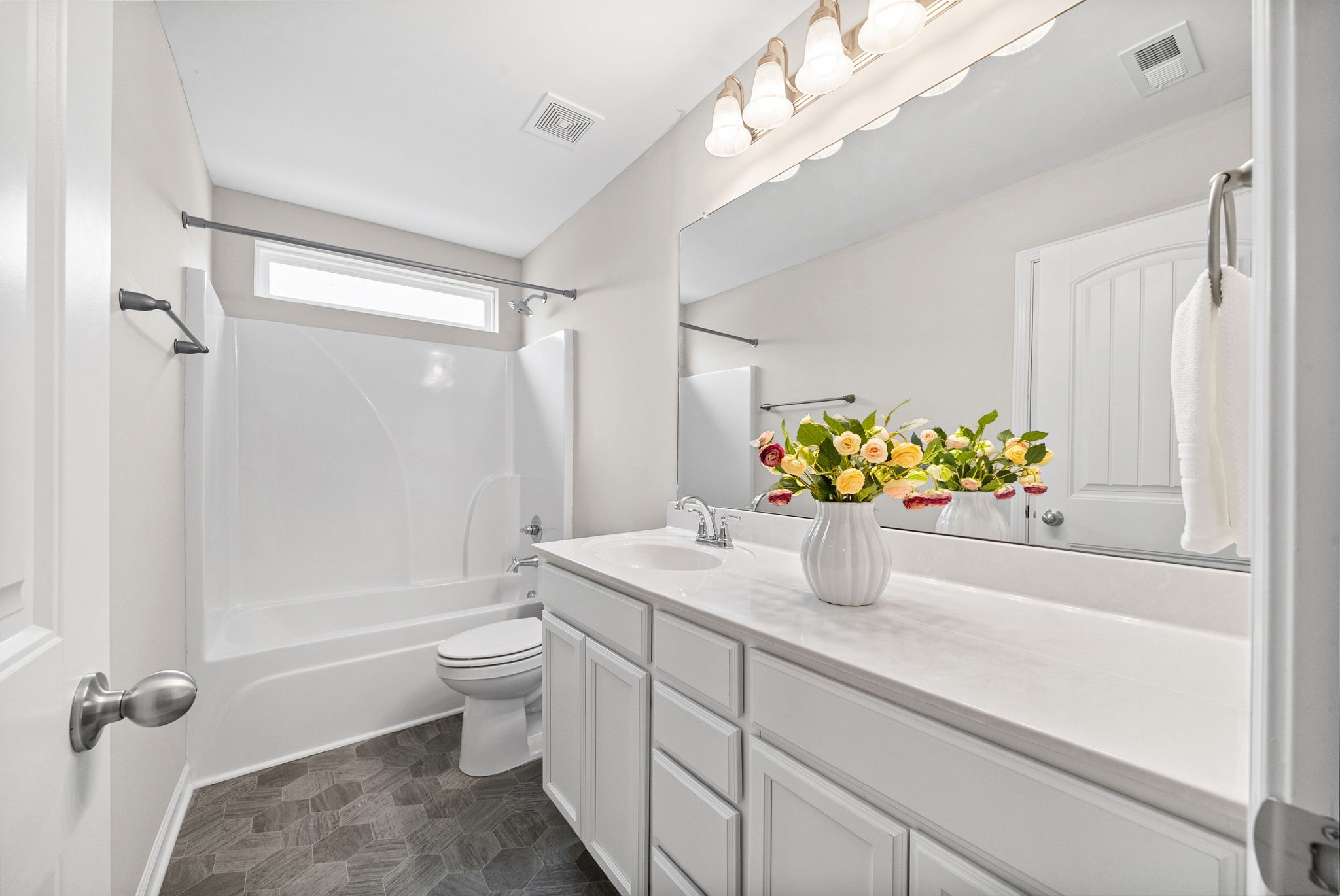 719 Reflections Lane Pleasant View, TN 37146 - Photo 28 of 46 a bathroom with a sink a toilet and shower