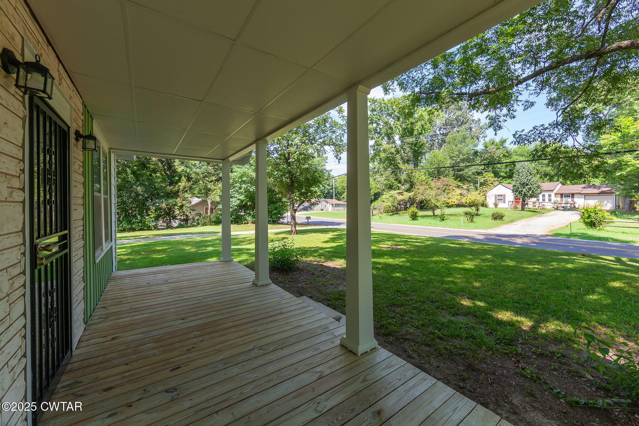 176 Old Denmark Road Jackson, TN 38301 - Photo 3 of 56 a view of a porch with wooden floor