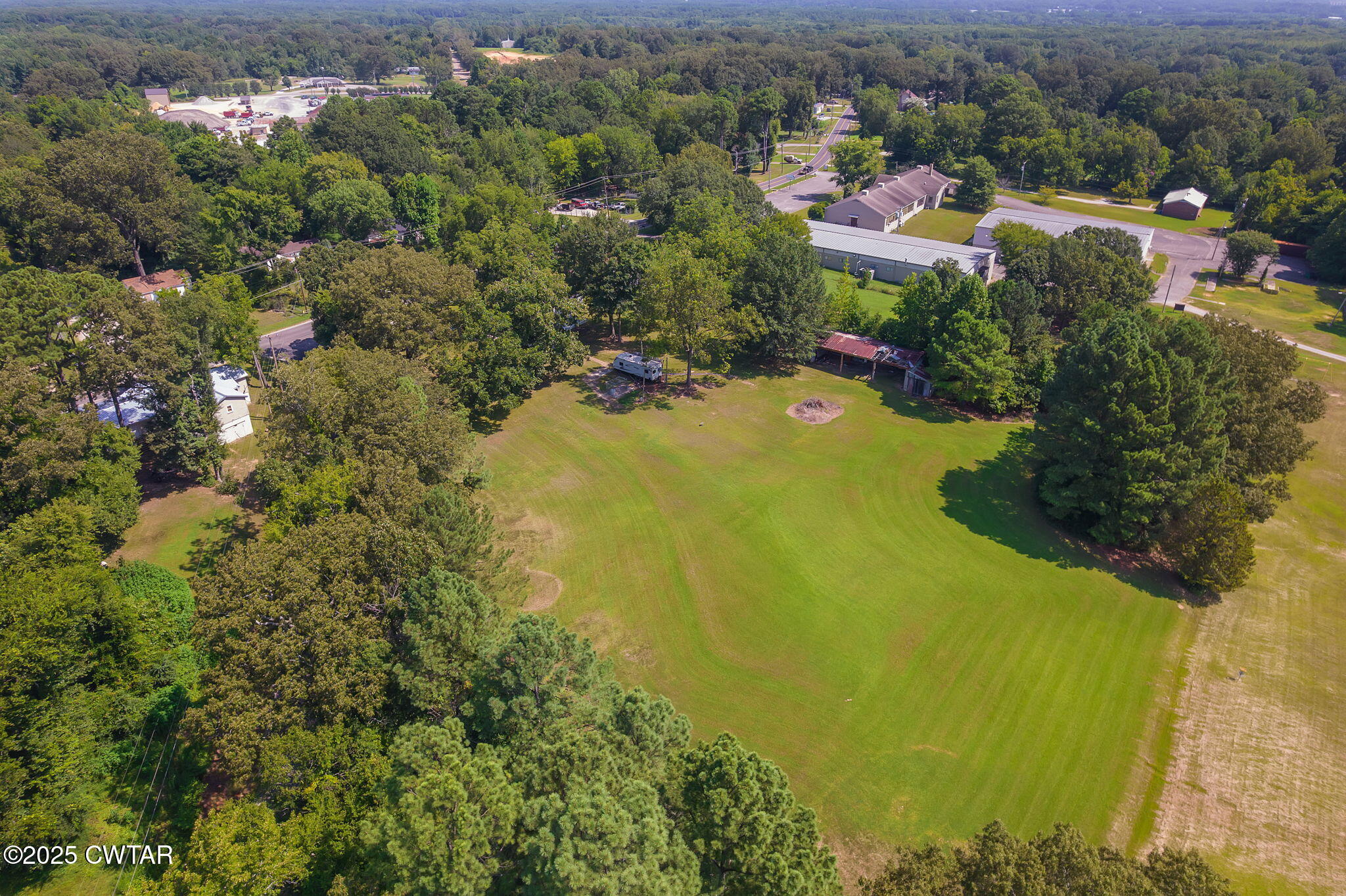 176 Old Denmark Road Jackson, TN 38301 - Photo 41 of 56 an aerial view of residential houses with yard and outdoor space