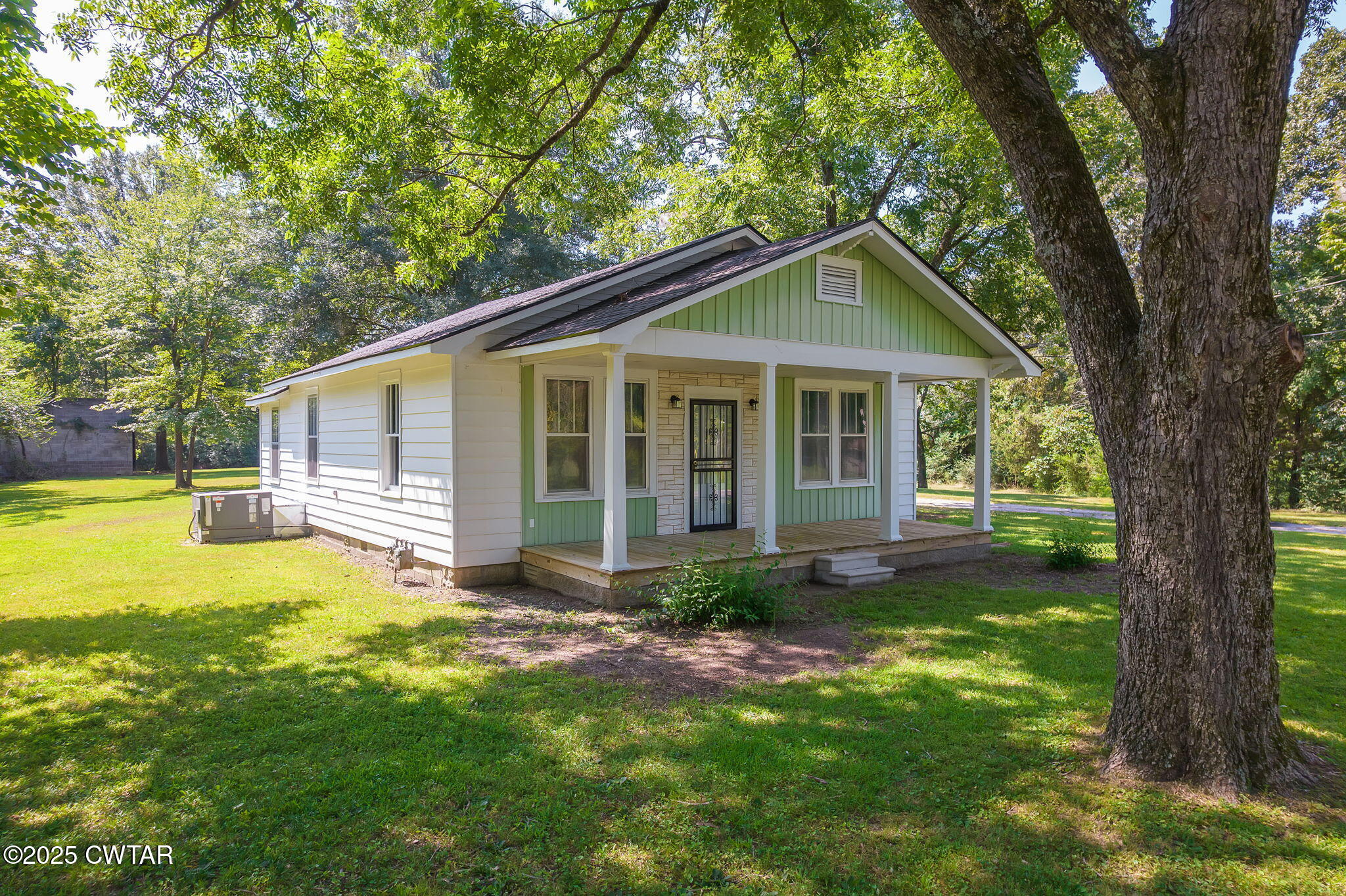 176 Old Denmark Road Jackson, TN 38301 - Photo 54 of 56 a view of a house with a yard and large tree