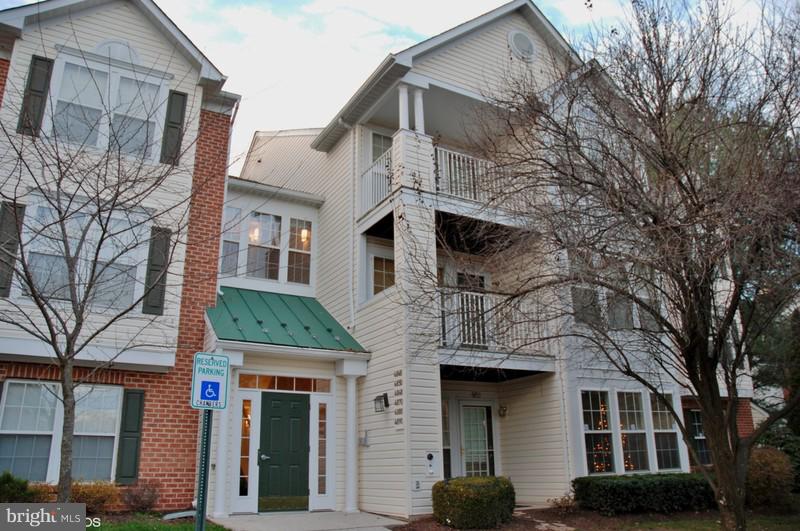4868 Shellbark Road Owings Mills, MD 21117 - Photo 1 of 23 a front view of a house with a tree