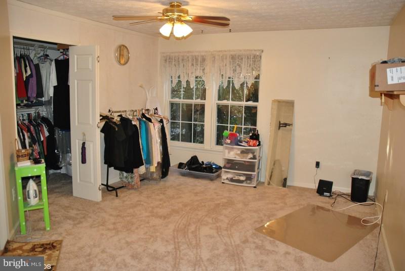 4868 Shellbark Road Owings Mills, MD 21117 - Photo 19 of 23 a view of a room with gym equipment