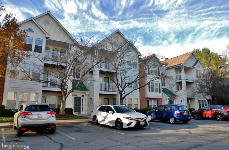 4868 Shellbark Road Owings Mills, MD 21117 - Photo 3 of 23 a car parked in front of a building