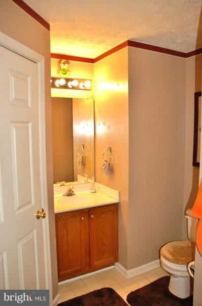 4868 Shellbark Road Owings Mills, MD 21117 - Photo 21 of 23 a bathroom with a sink and a mirror