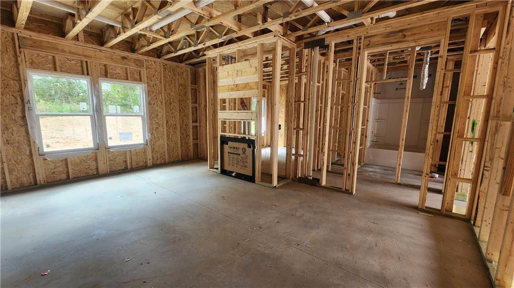 320 Silverleaf Trail Bethlehem, GA 30620 - Photo 6 of 20 an empty room with windows