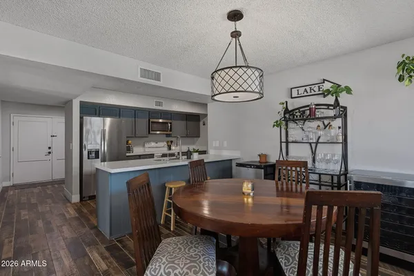 a bedroom with furniture and a ceiling fan