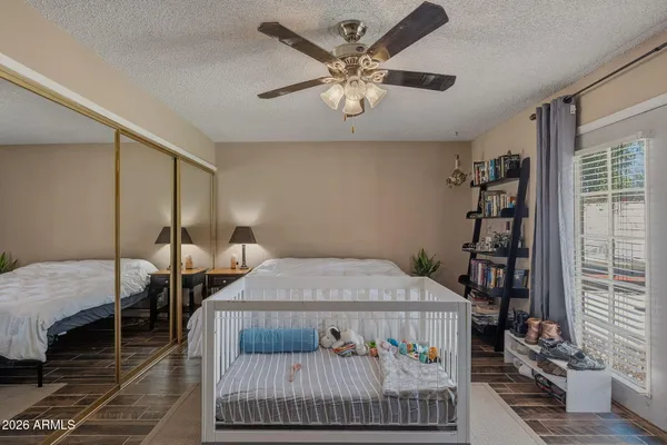 a room with gym equipment and flat screen tv