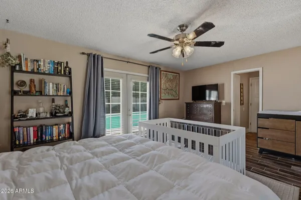 a white toilet sitting next to a shower curtain