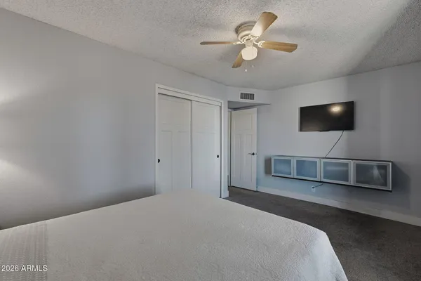 a living room with furniture and windows