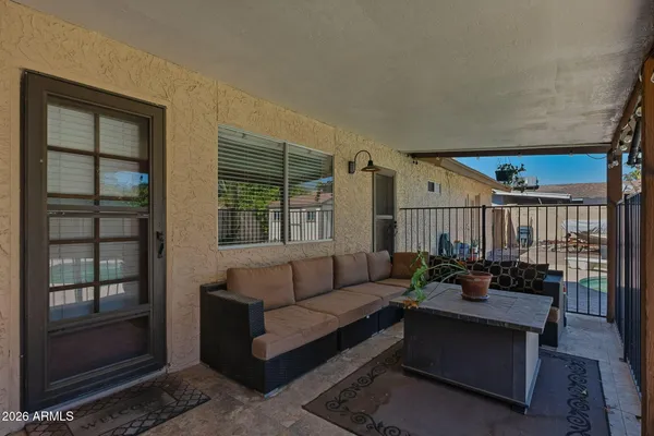 an aerial view of a house with swimming pool