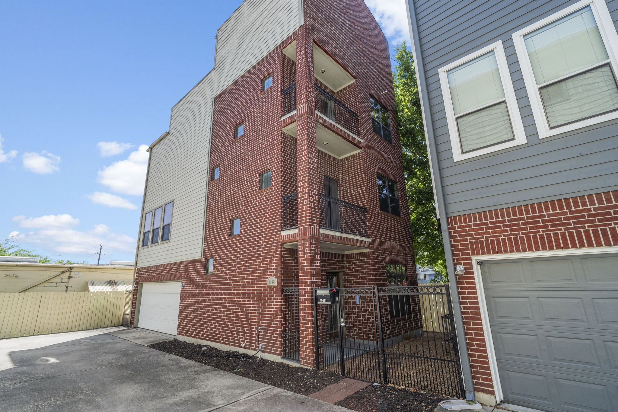 1218 Sandman Street Houston, TX 77007 - Photo 2 of 38 a view of a house with a garage