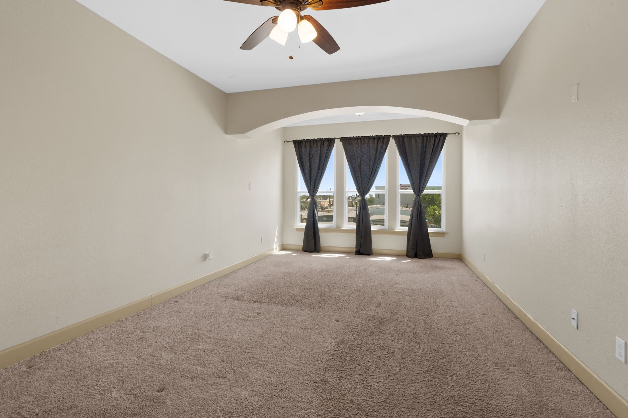 1218 Sandman Street Houston, TX 77007 - Photo 21 of 38 The third-floor primary bedroom feels spacious and serene with soft natural light, tall ceilings, and plenty of room for a full furniture layout.