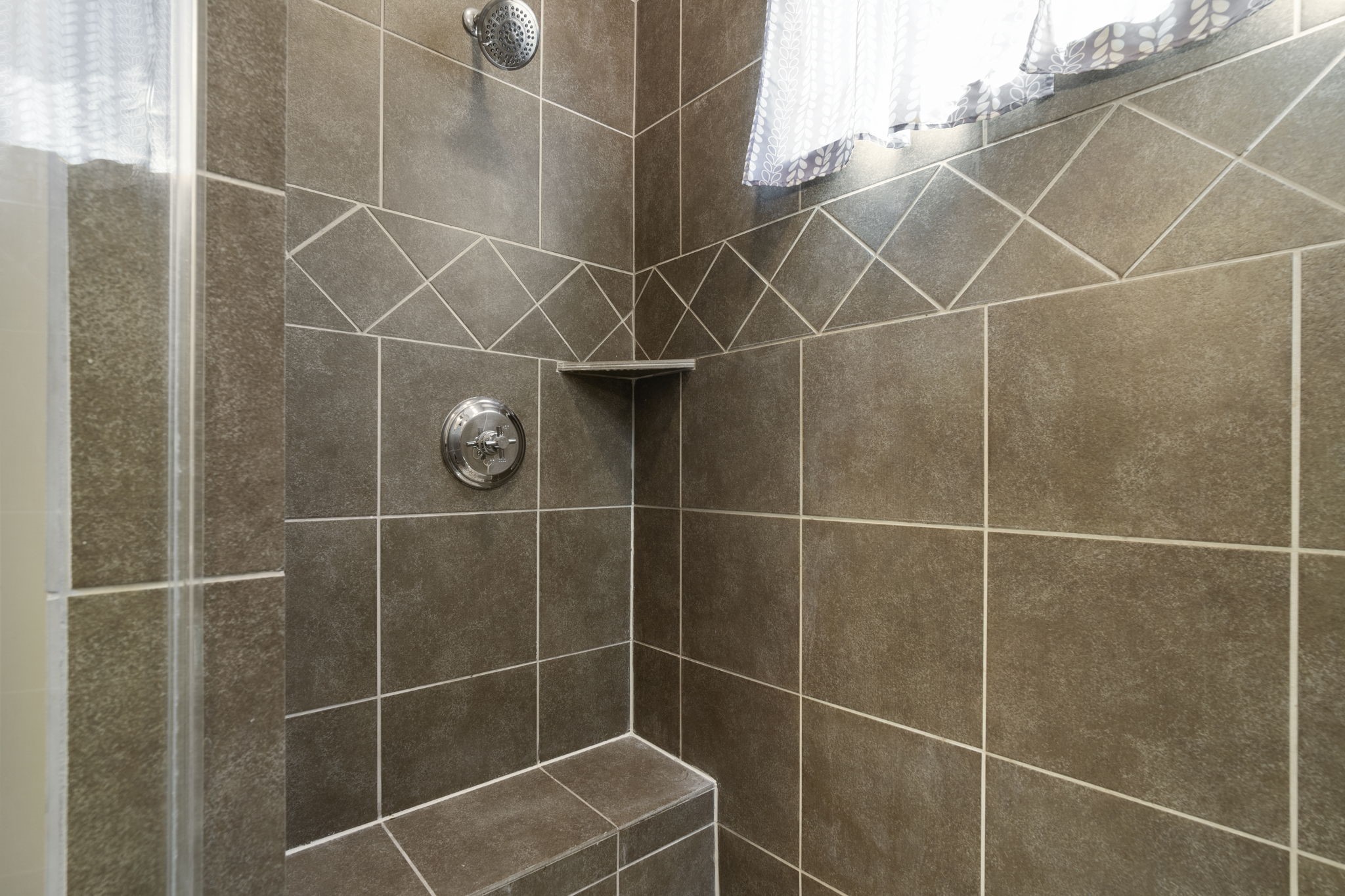 1218 Sandman Street Houston, TX 77007 - Photo 25 of 38 a bathroom with a shower and a window