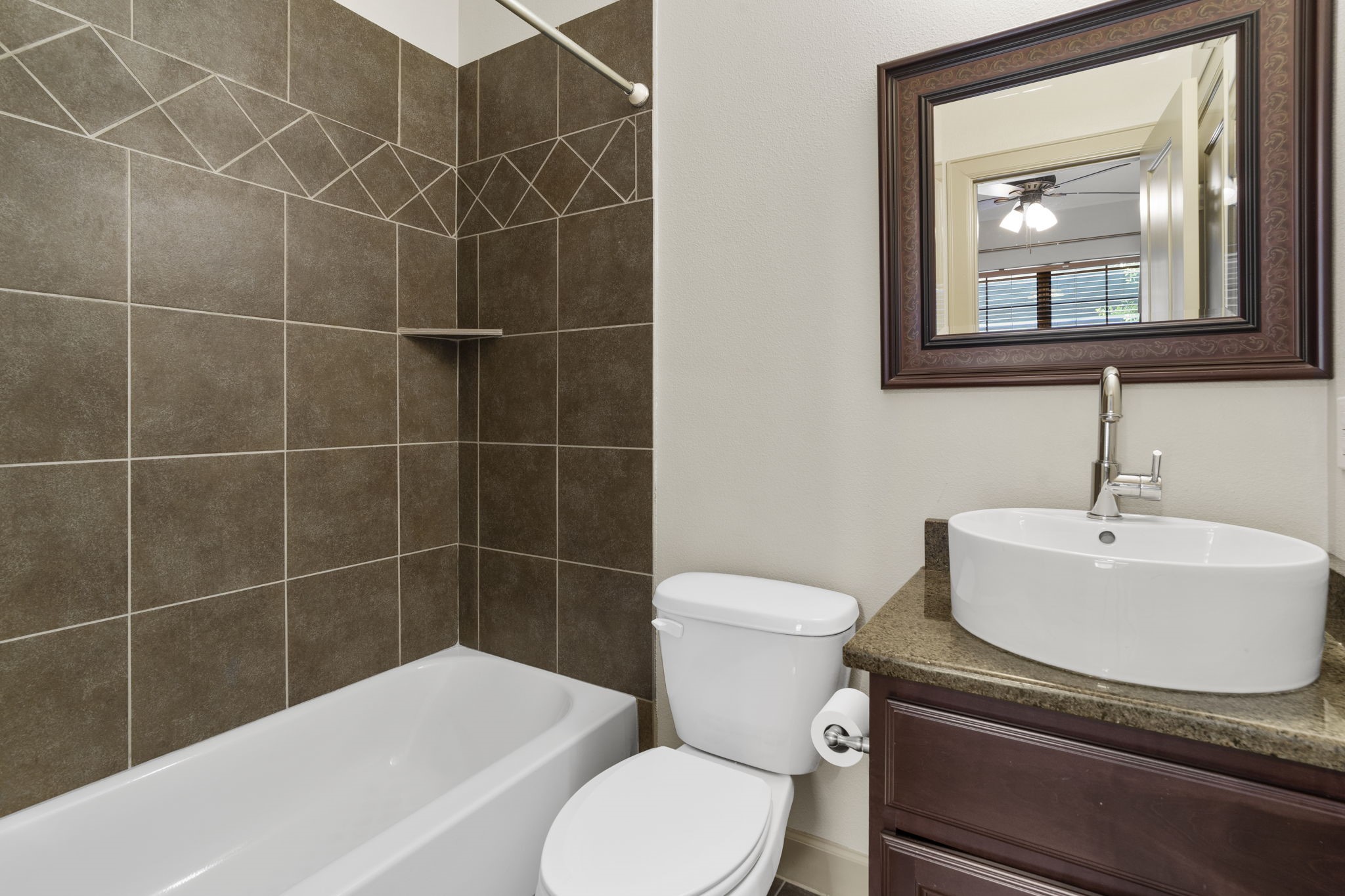 1218 Sandman Street Houston, TX 77007 - Photo 29 of 38 a bathroom with a sink toilet and shower