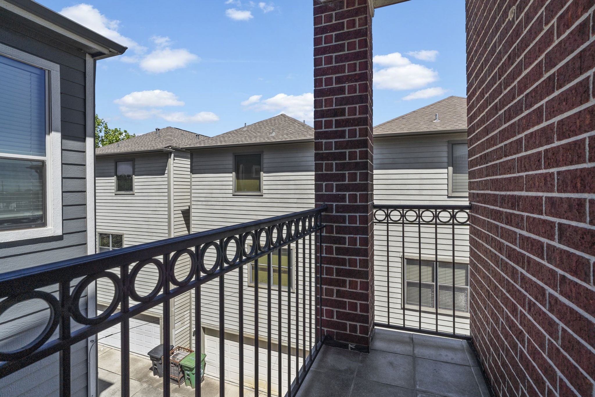 1218 Sandman Street Houston, TX 77007 - Photo 30 of 38 a view of a brick building from the balcony