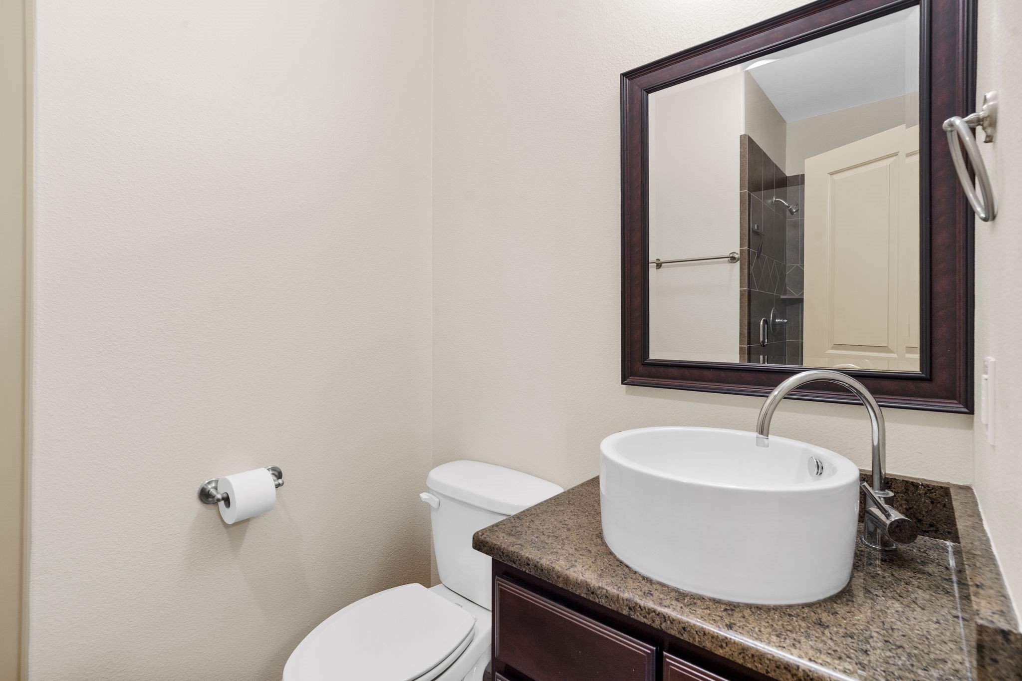 1218 Sandman Street Houston, TX 77007 - Photo 7 of 38 a bathroom with a sink and a mirror