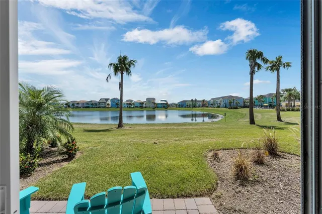 a view of a garden with a lake view