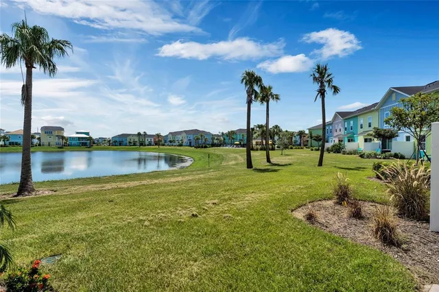 a view of a lake with a building in the background