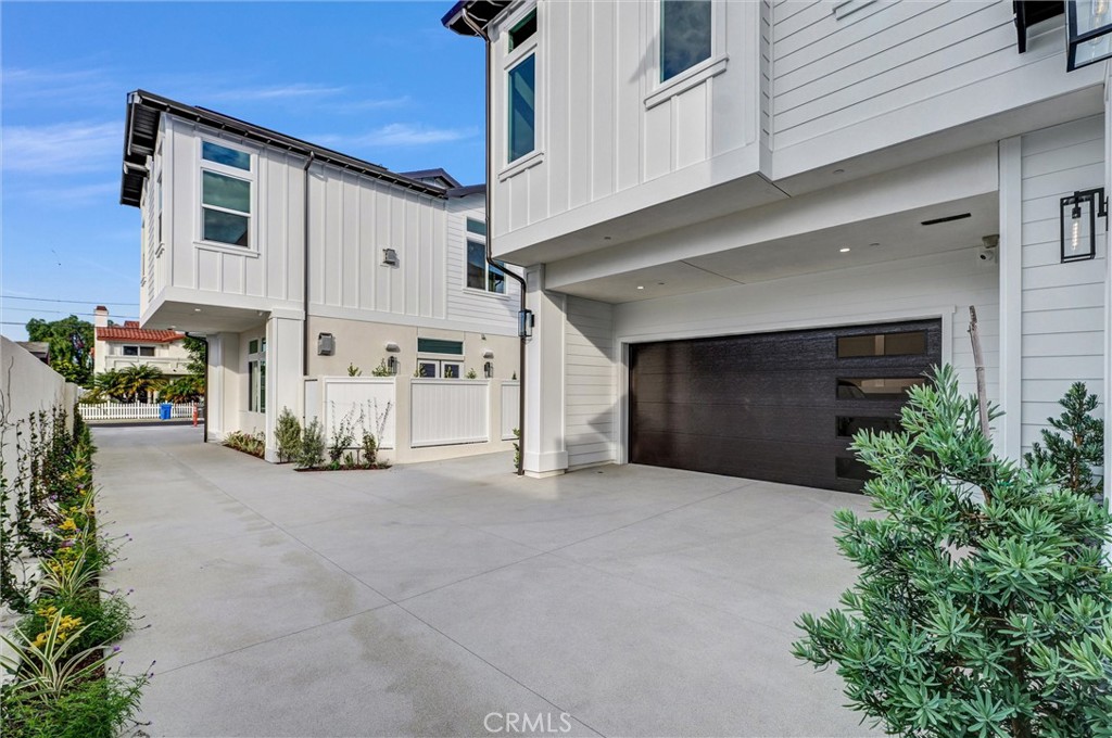 2016 Farrell Avenue, Unit B Redondo Beach, CA 90278 - Photo 3 of 51 a view of a house with garage and plants