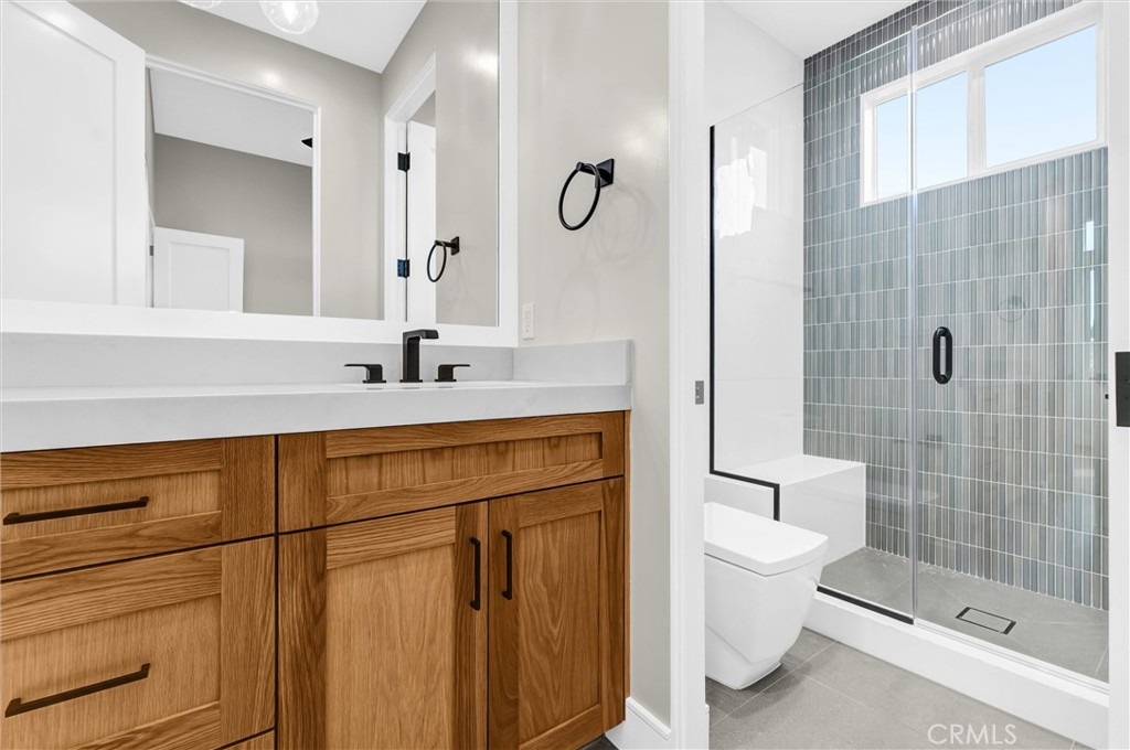 2016 Farrell Avenue, Unit B Redondo Beach, CA 90278 - Photo 40 of 51 a bathroom with a sink a toilet and shower