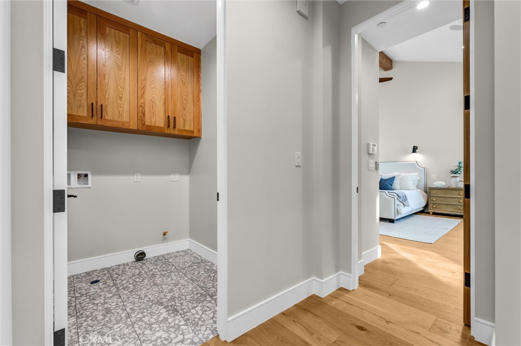 2016 Farrell Avenue, Unit B Redondo Beach, CA 90278 - Photo 43 of 51 a bedroom with a bed and wooden floor