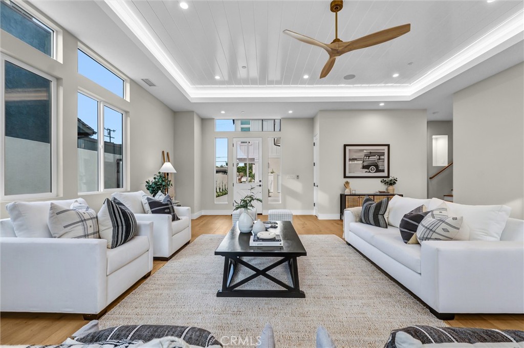 2016 Farrell Avenue, Unit B Redondo Beach, CA 90278 - Photo 7 of 51 a living room with furniture a rug and a chandelier