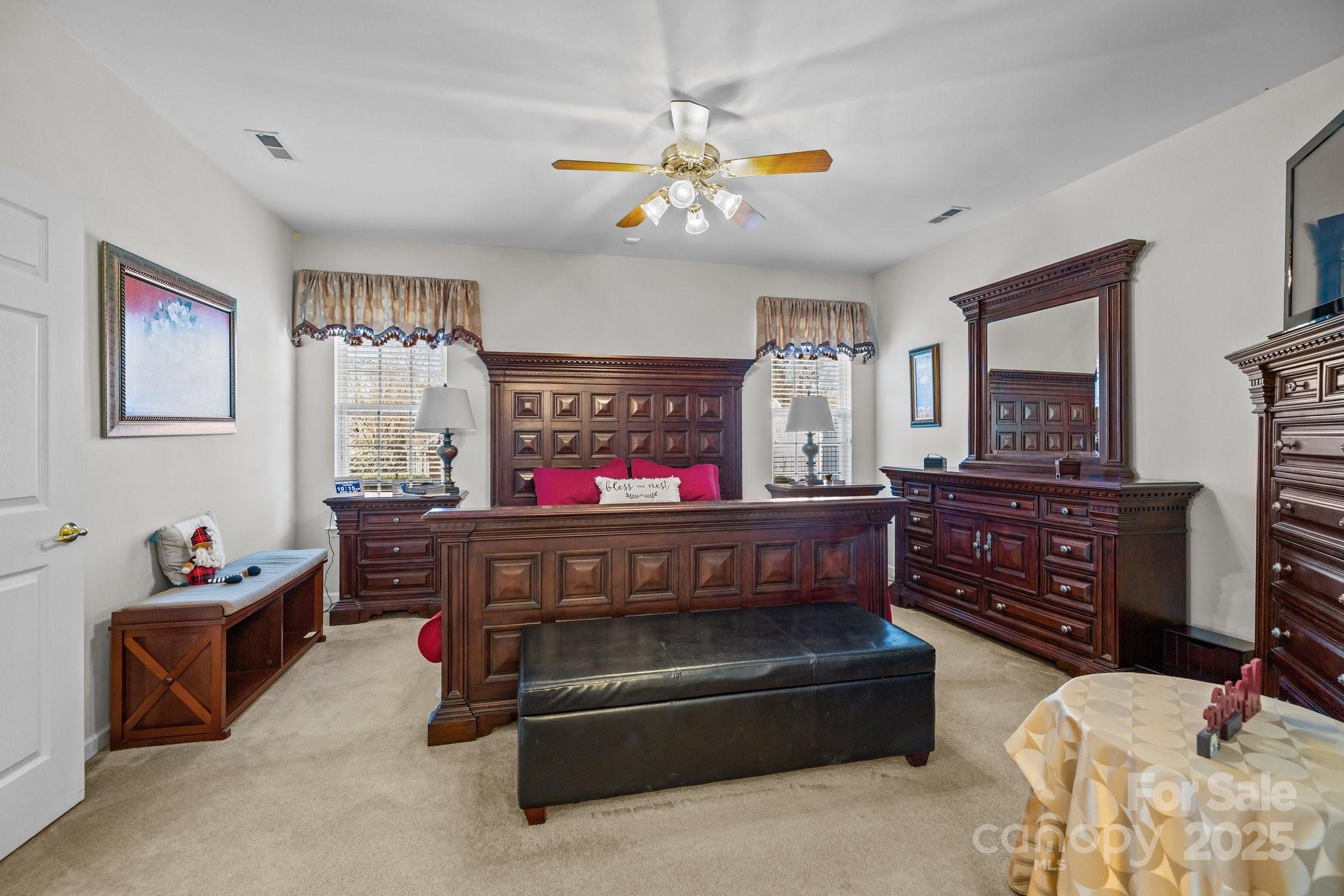 1668 Onyx Ridge, Unit 116 Fort Mill, SC 29708 - Photo 11 of 20 a bedroom with furniture and window