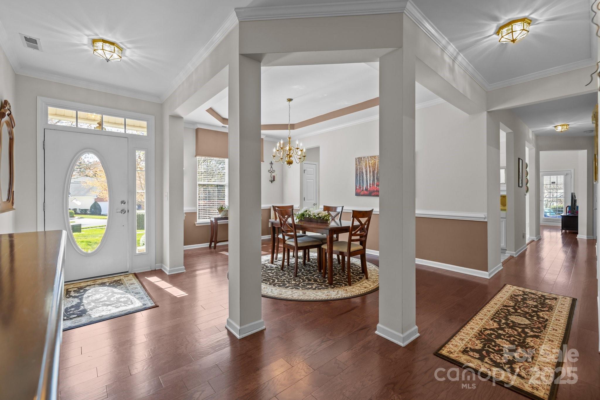 1668 Onyx Ridge, Unit 116 Fort Mill, SC 29708 - Photo 4 of 20 a view of a living room and dining room