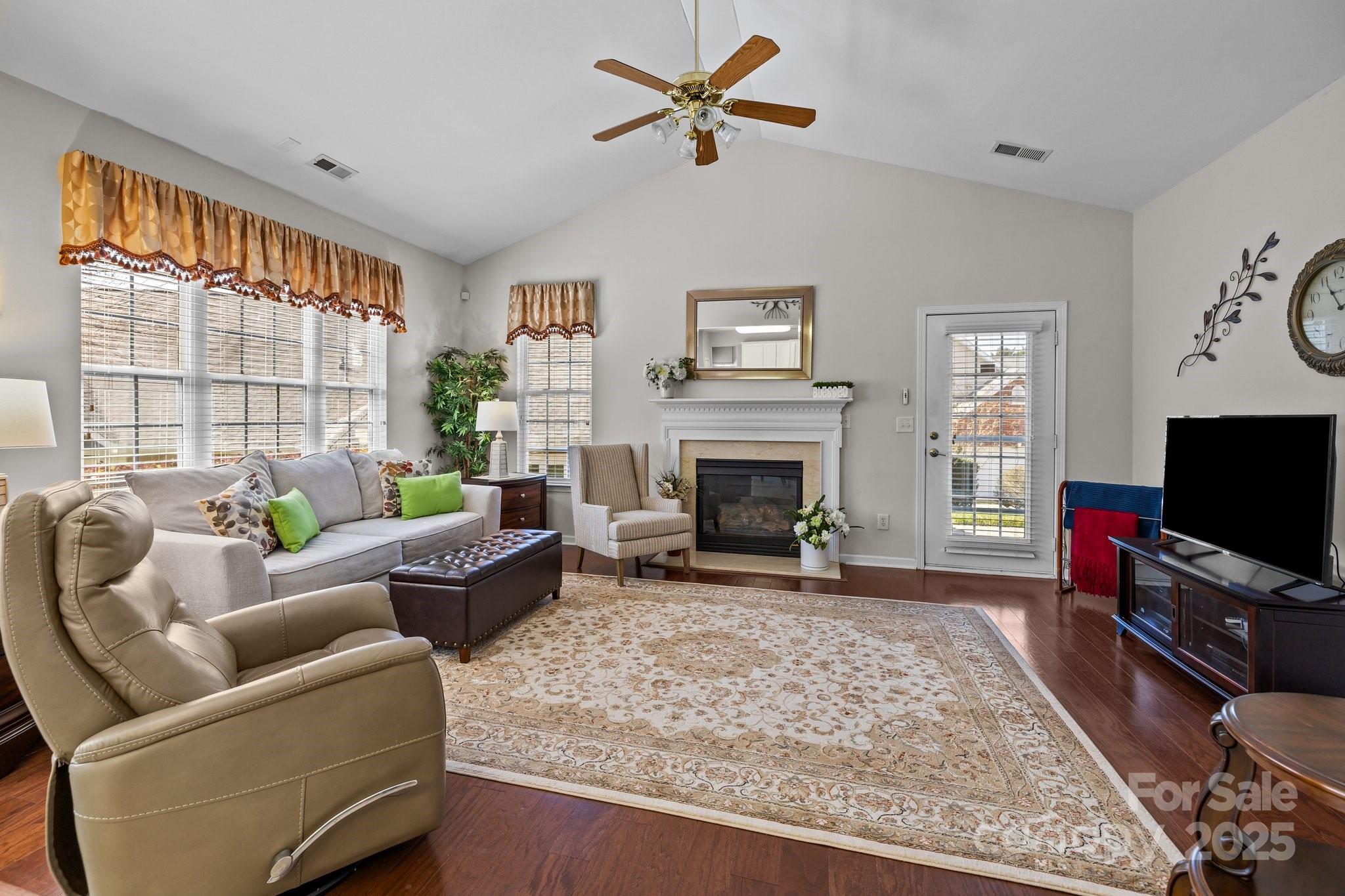 1668 Onyx Ridge, Unit 116 Fort Mill, SC 29708 - Photo 8 of 20 a living room with furniture and a flat screen tv