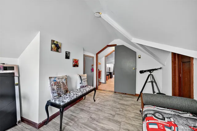 a bedroom with a large bed and a closet