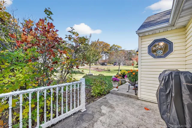 a view of a two chairs in the roof deck