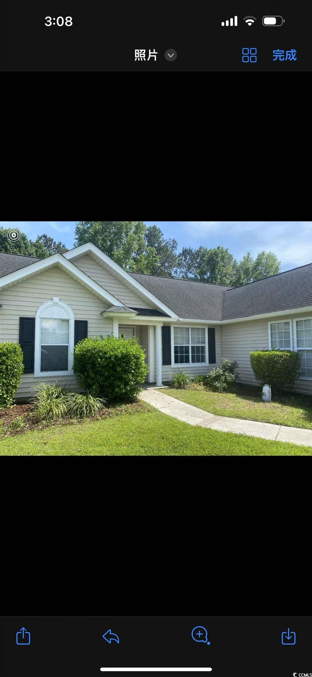 Ranch-style home featuring a front yard