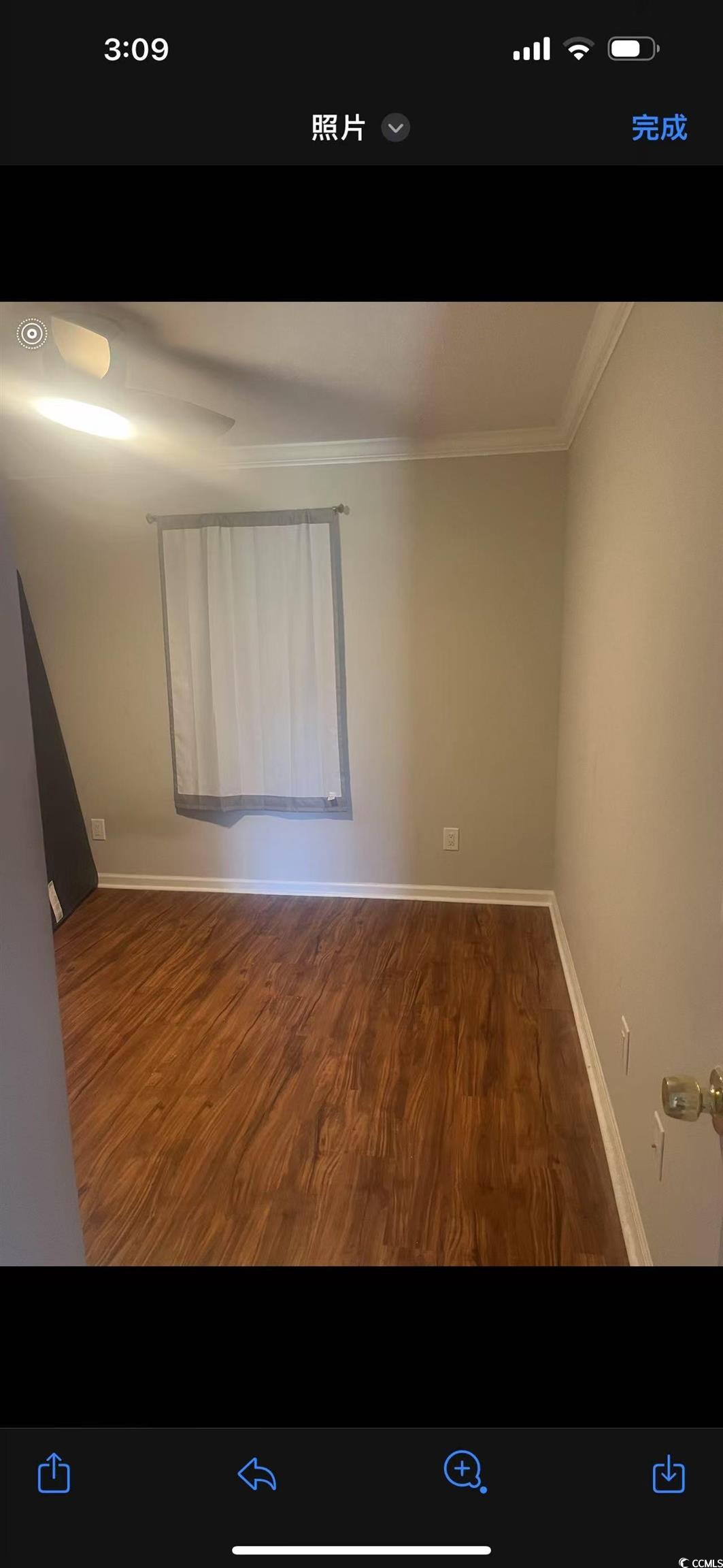 342 Pilothouse Drive Myrtle Beach, SC 29577 - Photo 4 of 5 Unfurnished room with ornamental molding, wood fin