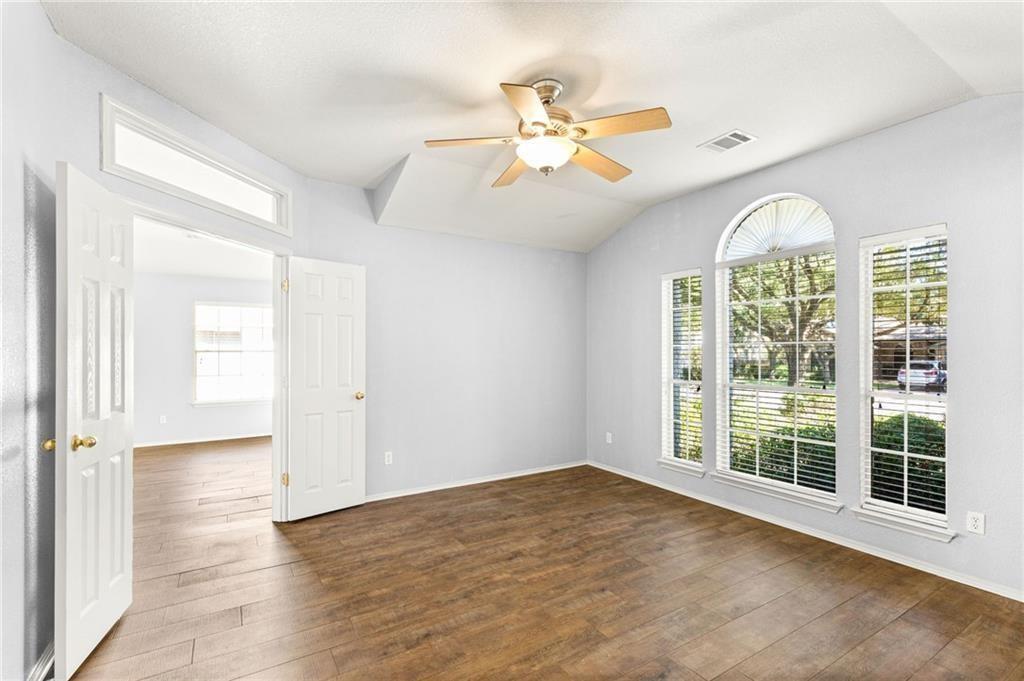 10708 Sycamore Hills Road Austin, TX 78717 - Photo 2 of 10 a view of an empty room with a window