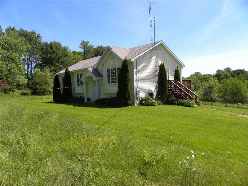 227 Lowell Town Road Wiscasset, ME 04578 - Photo 20 of 24 Exterior Side View.