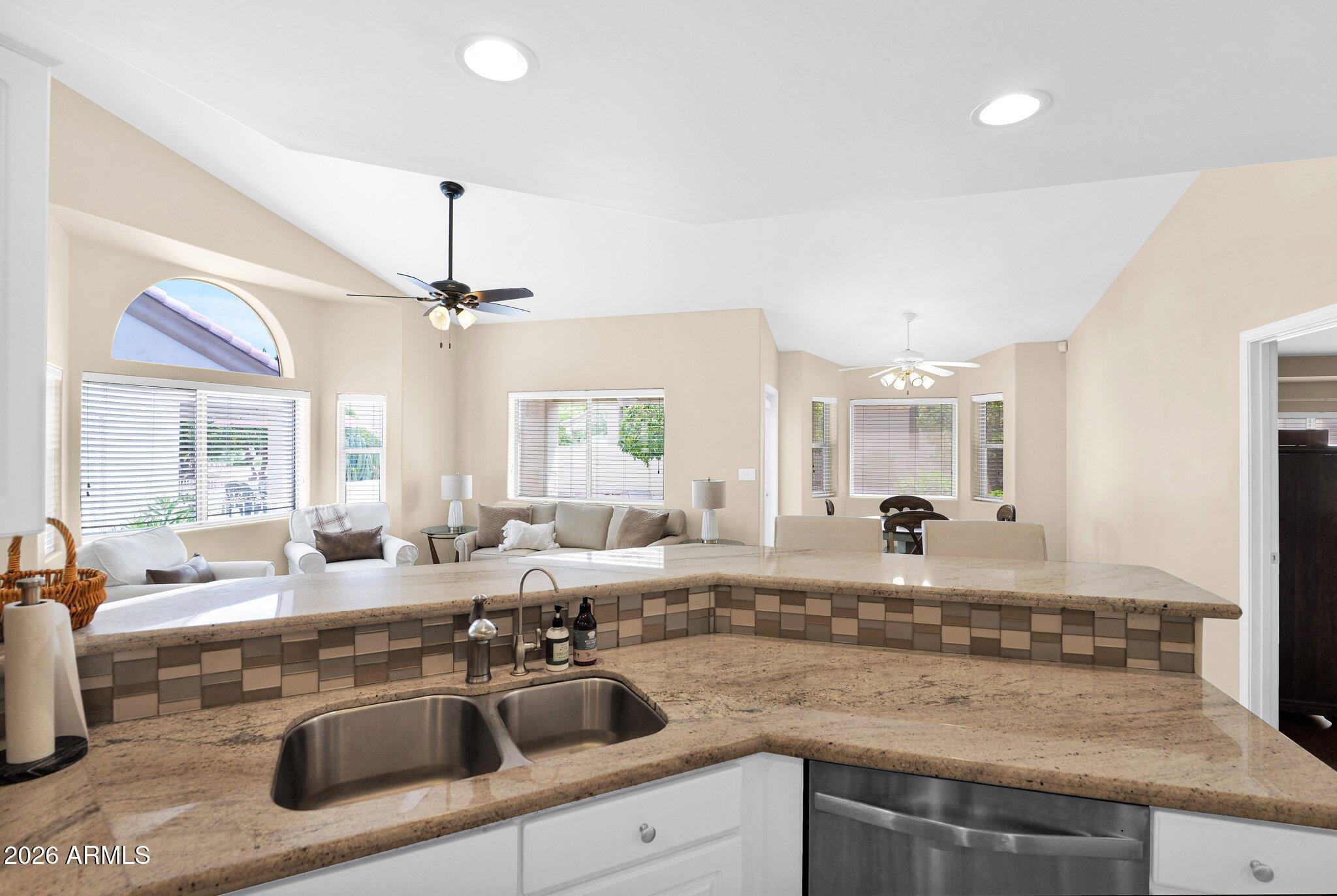 5830 East McKellips Road, Unit 110 Mesa, AZ 85215 - Photo 15 of 45 a kitchen with a sink and a counter top space