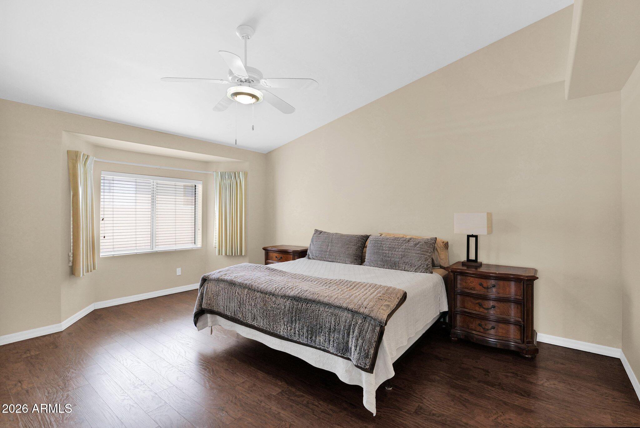5830 East McKellips Road, Unit 110 Mesa, AZ 85215 - Photo 21 of 45 a bedroom with a bed and window